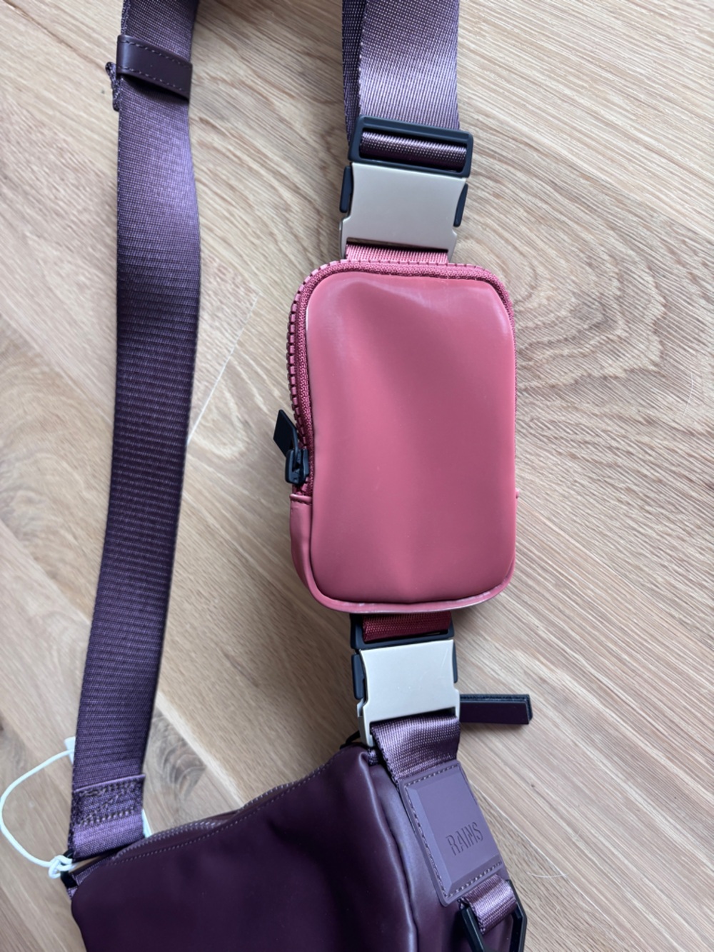 Rains Plum Sling Bag with Rose Pink Detachable Pouch - Picture 2 of 4
